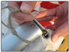 Photo 24, Secure the tack of the mainsail